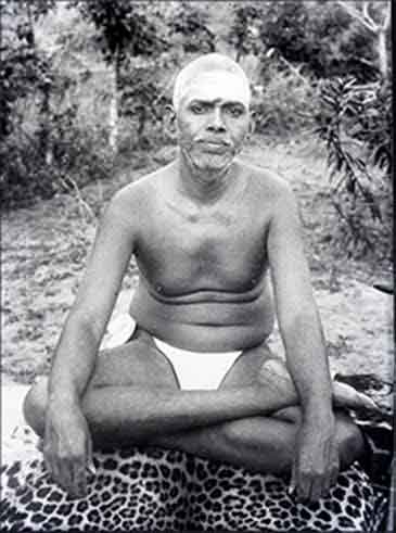 enlightened spiritual teacher Ramana Maharsi sitting on a tiger skin